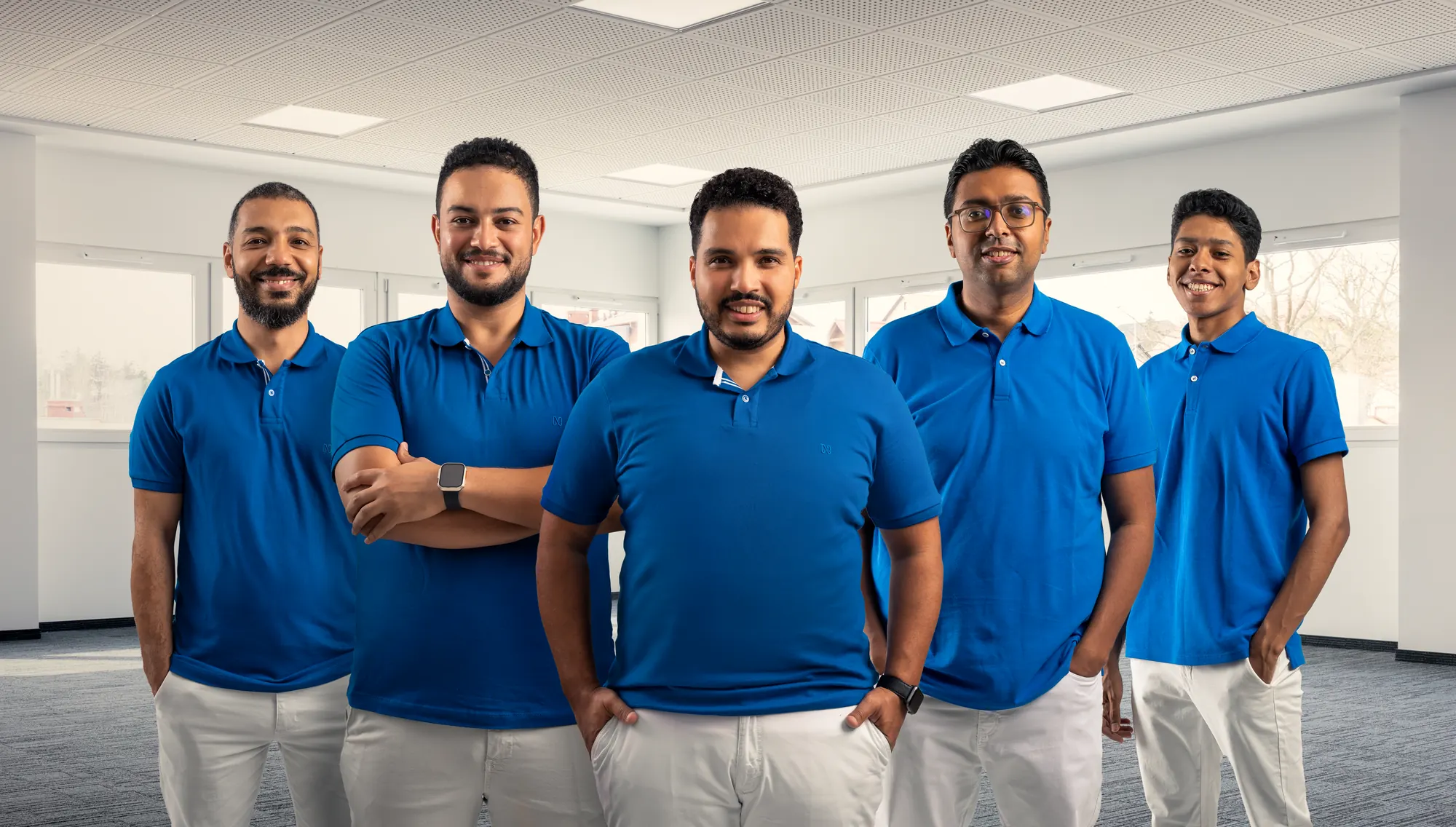 The Shobly team in matching blue polos